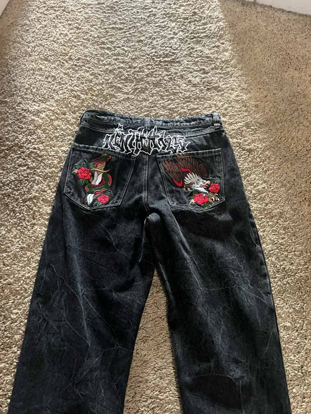 Black Embroidered Denim Jeans with Eagle and Snake Pockets